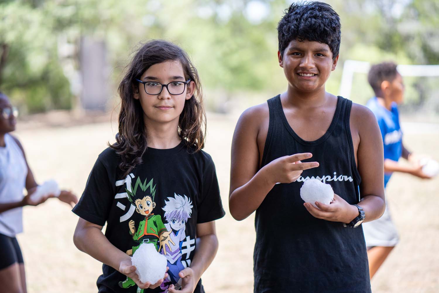 Two Lake Travis campers posing for a photo while outside